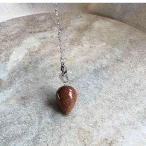 Guldsten Pendul